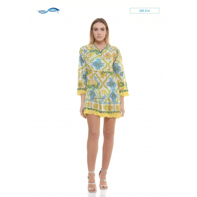 Fringed kaftan and hand-embroidered pom-pom