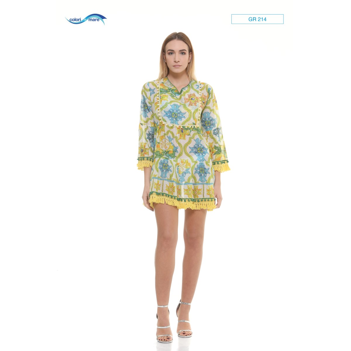 Fringed kaftan and hand-embroidered pom-pom